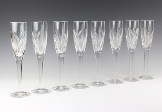 A set of 8 Waterford Crystal champagne glasses designed by John Rocha 