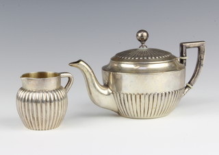 An 800 standard batchelor's demi-fluted teapot and cream jug, gross 236 grams