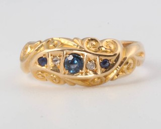 An 18ct yellow gold sapphire and diamond ring size N, 2.4 grams