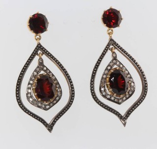 A pair of silver gilt Edwardian style diamond and garnet drop earrings 