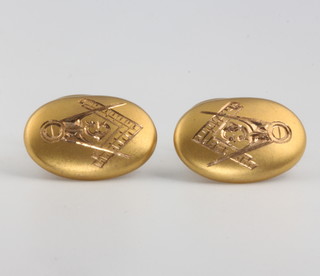 A pair of 9ct yellow gold bright cut Masonic cufflinks 6.3 grams