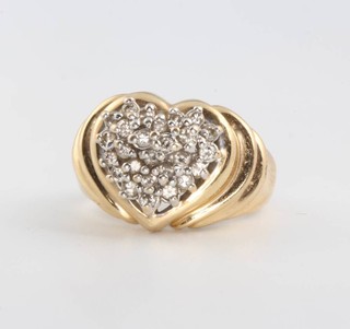 A 14ct yellow gold diamond set heart shaped ring size K, 7.2 grams
