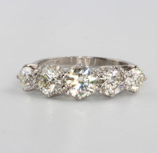A platinum 5 stone diamond ring approx. 2.5ct, size N 