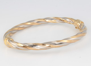 A 9ct 2 colour gold bangle approx. 9 grams gross