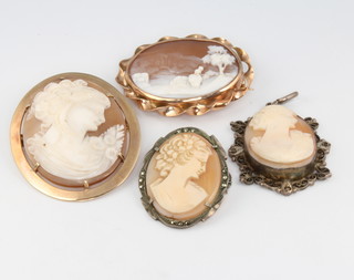 Two 9ct yellow gold mounted cameo brooches, two silver ditto 