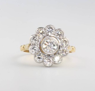 An 18ct yellow gold 11 stone diamond cluster ring approx. 1.75ct, size Q 