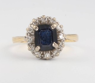An 18ct yellow gold sapphire and diamond cluster ring size L 1/2, 2.8 grams