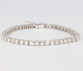 An 18ct white gold brilliant cut diamond line bracelet, 2ct, 180mm 