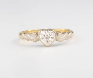 An 18ct yellow gold diamond set heart shaped ring, 3 grams, size I 