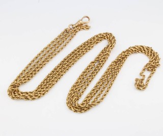 A 9ct yellow gold rope twist muff chain with 15ct yellow gold clasp, 32 grams, 65cm 