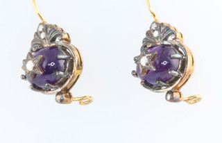 A pair of Edwardian style silver gilt cabochon amethyst and diamond earrings