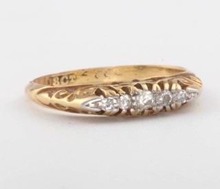 An 18ct yellow gold 5 stone diamond ring 2.1 grams, size I 1/2