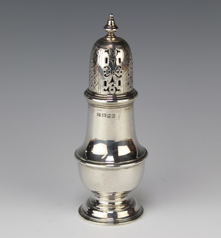 A silver sugar caster of baluster form London 1937, 19cm, 209 grams 
