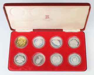 A set of 8 commemorative 1977 silver medallions 228 grams, cased 