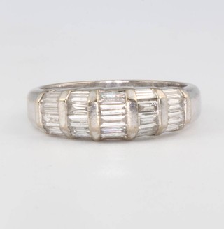 An 18ct white gold baguette diamond ring size O 
