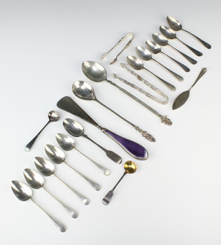 A pair of Georgian silver sugar tongs and minor spoons and flatware, pierced bon bon dish etc 370 grams 