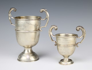 A silver 2 handled trophy cup Birmingham 1923, a larger sterling ditto 325 grams 