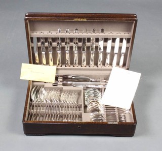 A canteen of Mappin and Webb silver plated cutlery for 6 with shell terminals contained in an oak canteen 