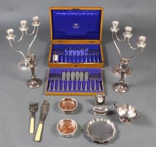 A silver plated card tray with Chippendale rim 15cm, a pair of plated candelabra and minor plated items 