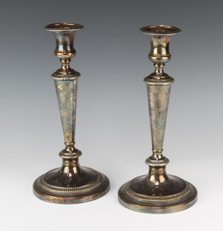 A pair of silver plated tapered candlesticks 31cm  