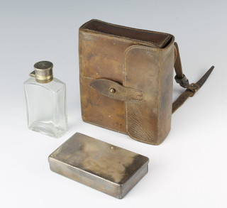 An Edwardian rectangular silver sandwich box London 1906 by Asprey and Company together with a silver plated mounted bottle contained in a leather pouch 