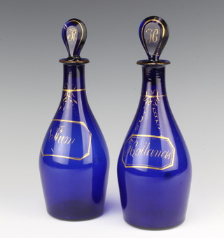 A Georgian Bristol blue glass club shaped Hollands decanter and stopper and a ditto Rum 25cm 