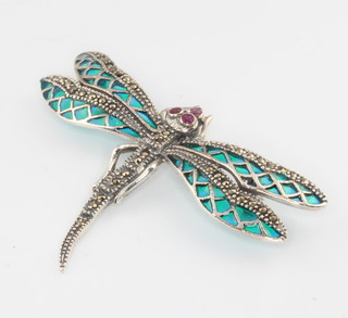 A silver enamelled brooch in the form of a dragonfly 