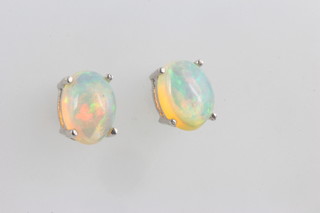 A pair of Ethiopian opal ear studs 1.2ct 