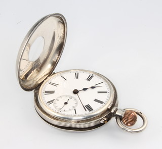 A silver half hunter pocket watch with blue enamelled decoration, the white enamelled dial with seconds at 6 o'clock 