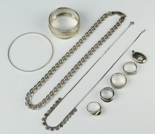 A silver bracelet and minor silver jewellery 100 grams 