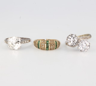 A yellow gold emerald and diamond ring together with 2 paste rings size Q 