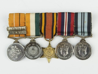 A World War Two miniature group of medals comprising Tibetan medal, Indian Independence medal 1947, Burma Star, War medal and India Service medal 1939-45 