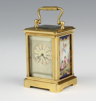 A 20th Century  miniature carriage timepiece with champagne dial and Roman numerals, with enamelled panels to the sides 5cm x 4cm x 3.5cm (no key) 