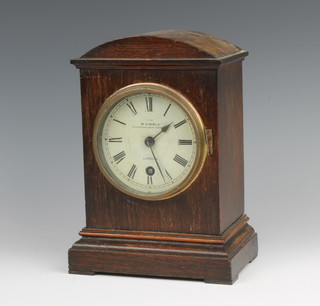 A 19th Century Continental 8 day timepiece, the painted dial with Roman numerals marked EXP by W Kibble 22 Gracechurch Street, London contained in an arched oak bookcase 
