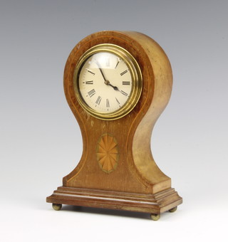 A bedroom timepiece, the paper dial with Roman numerals contained in an inlaid mahogany balloon shaped case 