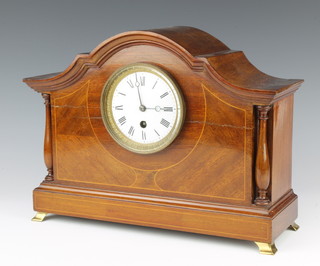 An Edwardian timepiece with enamelled dial and Roman numerals, contained in an inlaid mahogany case 