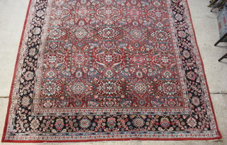 A red and blue ground Mahal carpet with floral design 522cm x 330cm 