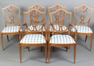 A set of 6 Edwardian inlaid mahogany Hepplewhite style shield back dining chairs with upholstered drop in seats, raised on square tapered supports - 2 carvers, 4 standard 