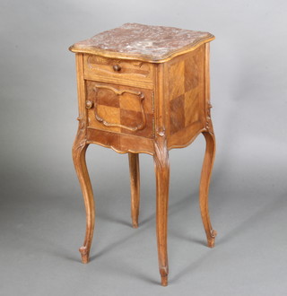 A 19th Century French carved oak bedside table of serpentine outline with pink veined marble top fitted 1 long drawer above a cupboard, raised on cabriole supports 81cm h x 40cm w x 40cm d 