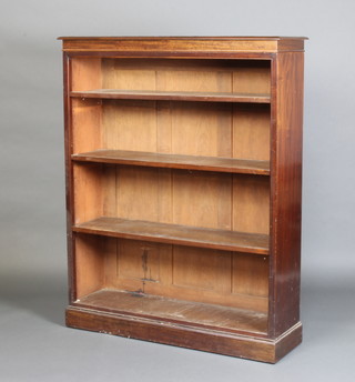 A Victorian rectangular mahogany open bookcase fitted adjustable shelves, raised on a platform base 134cm h x 107cm w x 31cm d 