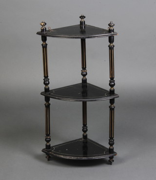 A Victorian ebonised 3 tier hanging corner what-not raised on turned and fluted columns 65cm h x 38cm w x 26cm d 