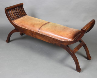 A mahogany window seat with upholstered seat, raised on outswept supports 59cm x 120cm x 36cm 