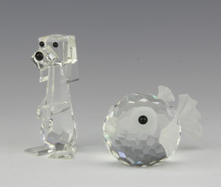 A Swarovski figure of a standing dog 7cm and one other of a blowfish 4cm, boxed 