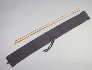 A Walker Brampton split cane 7' Brook trout fishing rod (line weight3/4) contained in an associated bag 