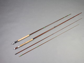 A Bruce Walker "The Deceiver" 7 weight fishing rod together and 1 other fly rod 
