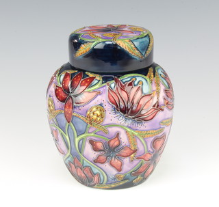 A contemporary Moorcroft ginger jar and cover decorated with exotic flowers, dated 2002 15cm, boxed