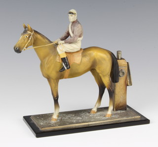 A spelter table lighter in the form of a race horse and jockey up, 16cm x 17cm x 9cm 