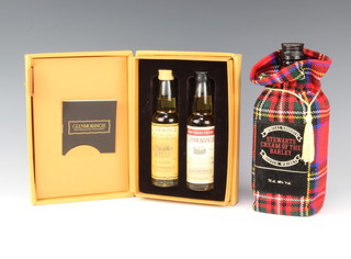 A 10cl bottle of Glenmorangie 10 year old single highland malt whisky and a 10cl bottle of port wood finished Glenmorangie single highland malt whisky, contained in presentation box together with a 70cl bottle of Stewarts Cream of The Barley Special Reserve scotch whisky  