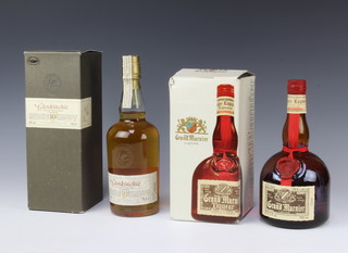 A 70cl bottle of Glenkinchie 10 year old single malt whisky and a 700ml bottle of Grand Marnier 