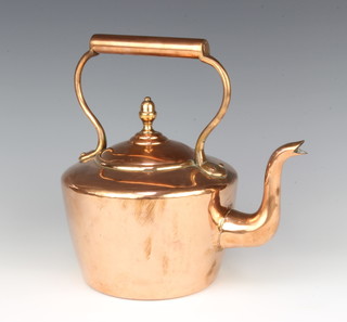 A 19th Century polished copper kettle with acorn finial, the base marked U 